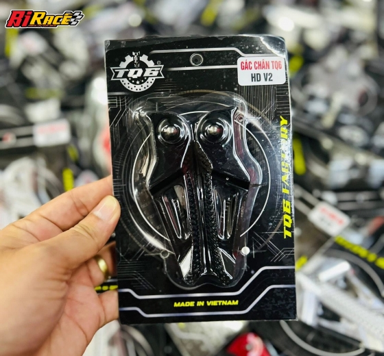 GÁC CHÂN CNC TQ6 V2 - HONDA- ĐEN, BẠC